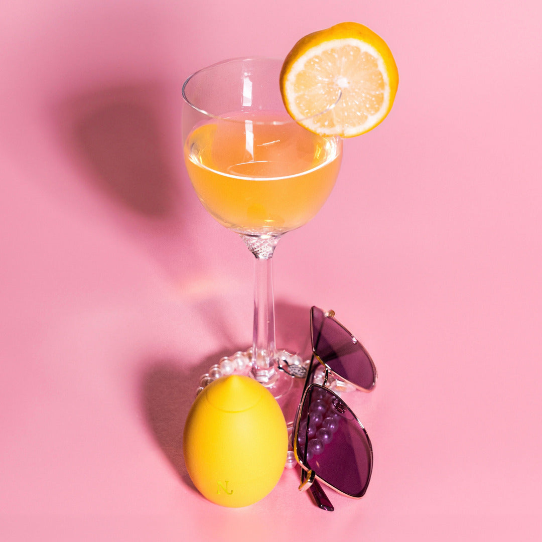Lemon adult toy in hand